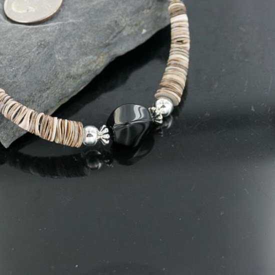 Certified Authentic Navajo .925 Sterling Silver Graduated Melon Shell and Black Onyx Turquoise Native American Necklace 15554-14 Certified Authentic Navajo .925 Sterling Silver Graduated Melon Shell and Black Onyx Turquoise Native American Necklace 15554-14