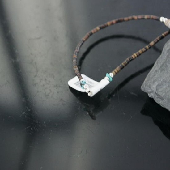 Certified Authentic Navajo .925 Sterling Silver Graduated Melon Shell and Black Onyx Turquoise Native American Necklace 15554-14 Certified Authentic Navajo .925 Sterling Silver Graduated Melon Shell and Black Onyx Turquoise Native American Necklace 15554-14