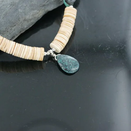 Certified Authentic Navajo .925 Sterling Silver Graduated Melon Shell and STORMY MTN. Turquoise 19 Native American Necklace 7501008-19 Certified Authentic Navajo .925 Sterling Silver Graduated Melon Shell and STORMY MTN. Turquoise 19 Native American Necklace 7501008-19
