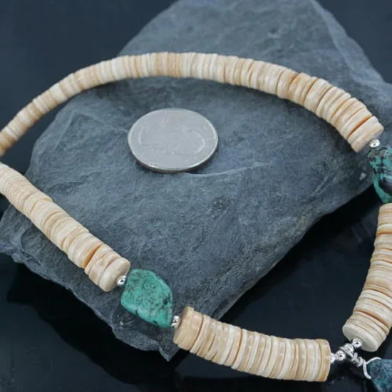 Certified Authentic Navajo .925 Sterling Silver Graduated Melon Shell and STORMY MTN. Turquoise 19 Native American Necklace 7501008-19 Certified Authentic Navajo .925 Sterling Silver Graduated Melon Shell and STORMY MTN. Turquoise 19 Native American Necklace 7501008-19