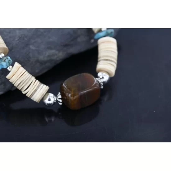 Certified Authentic Navajo .925 Sterling Silver Graduated Melon Shell and Tigers Eye Turquoise Native American Necklace 15562-58 Certified Authentic Navajo .925 Sterling Silver Graduated Melon Shell and Tigers Eye Turquoise Native American Necklace 15562-58
